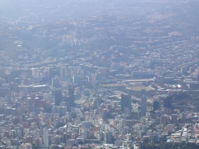 View of Caracas. In the center at the right, the stadiums of the “ciudad universitaria” (campus)